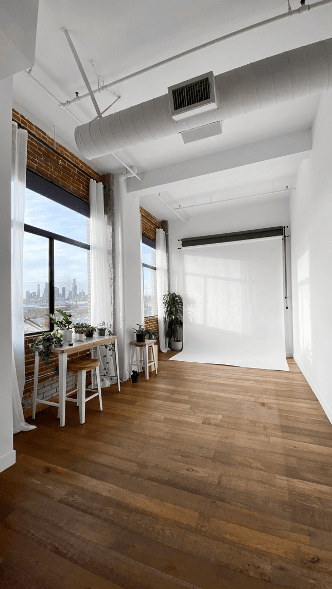 A loft studio with air ducts